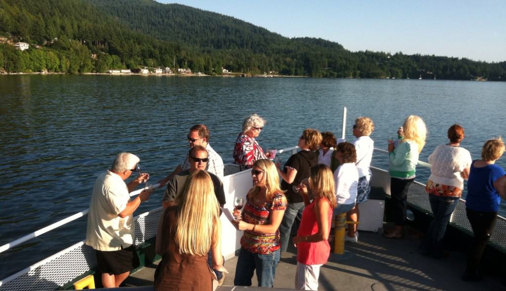 unwined on the bay bellingham wine tasting cruise guests on bow of victoria star
