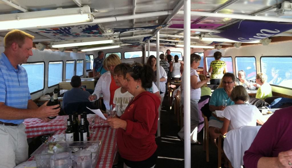 unwined on the bay bellingham wine tasting cruise guests on upper deck of victoria star